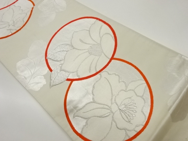 丸文に椿・花葉模様織出し袋帯